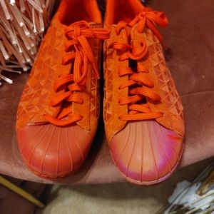 Red Adidas sz9.5 men 11 women
